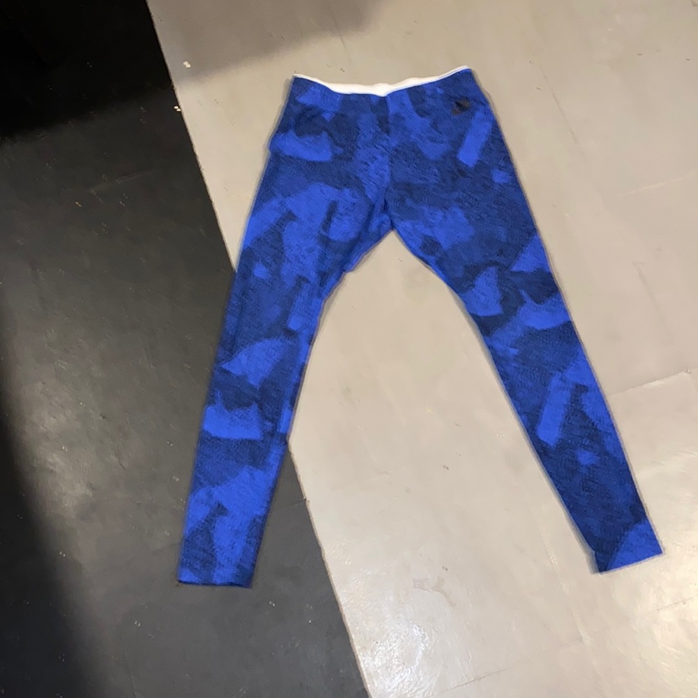 Nike woman’s blue and black leggings size medium!